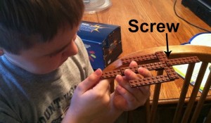 This he explained is a crossbow. A crossbow uses a screw to pull back the string.