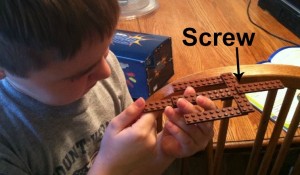 This he explained is a crossbow. A crossbow uses a screw to pull back the string.